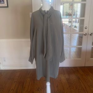 Club Monaco long sleeve dress with beautiful details front and back.